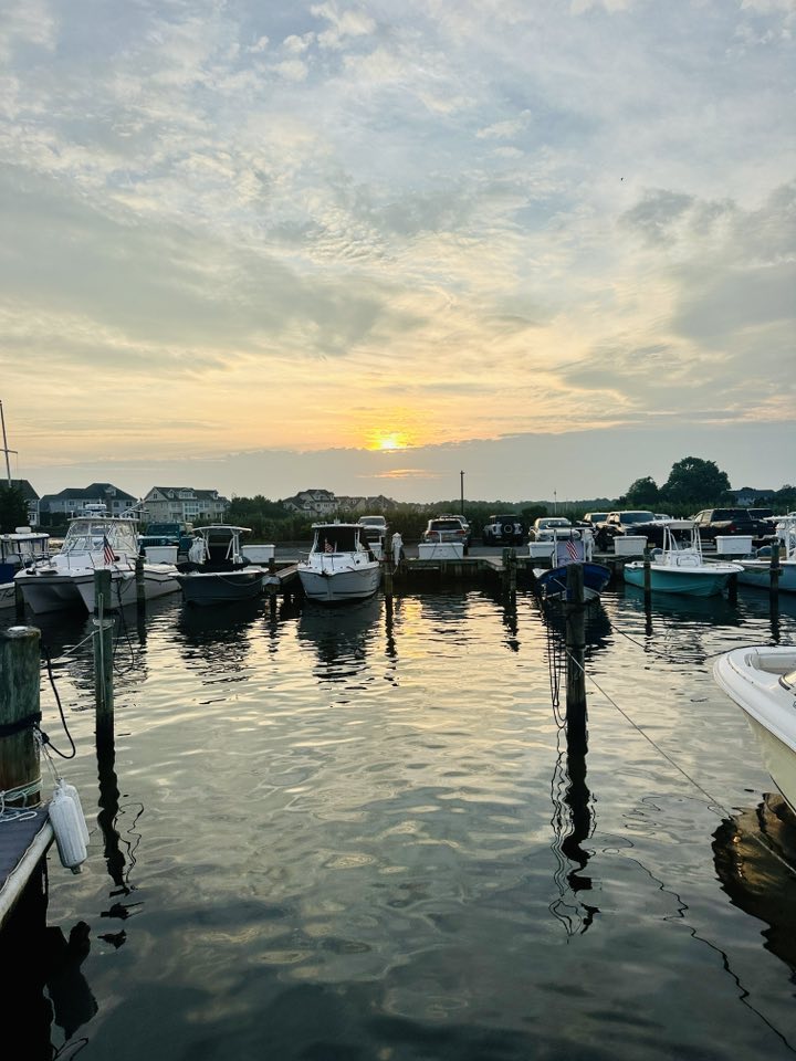 Boats at the dock at sunset